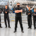 Futuristic space data center with satellites and solar powered AI servers orbiting Earth representing space based computing